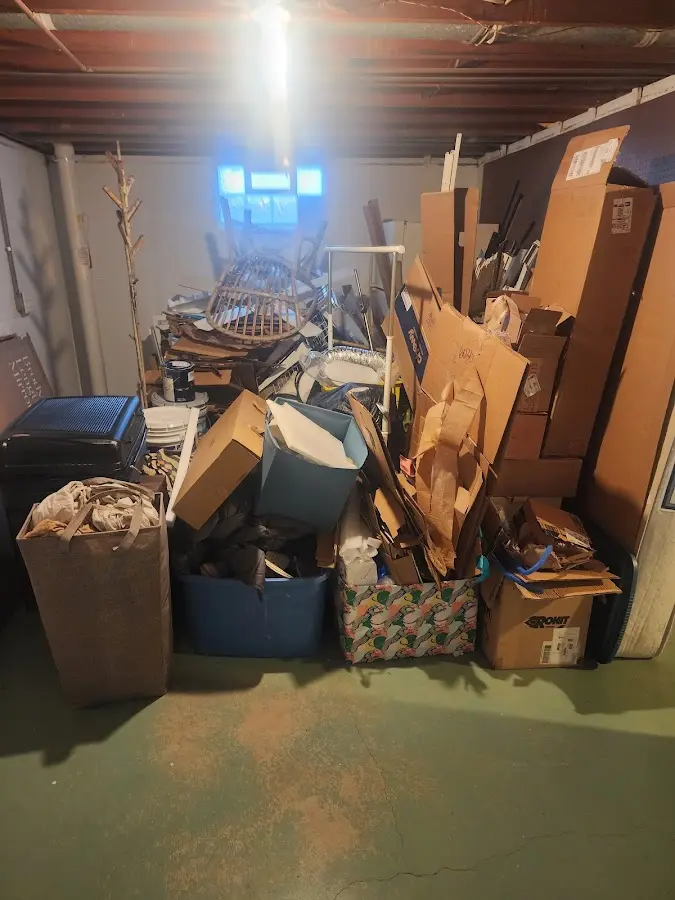 Roll-off dumpster container at job site for 2 Yard Dumpster Rental in Newington Forest